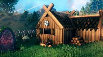 A wooden cabin in a field