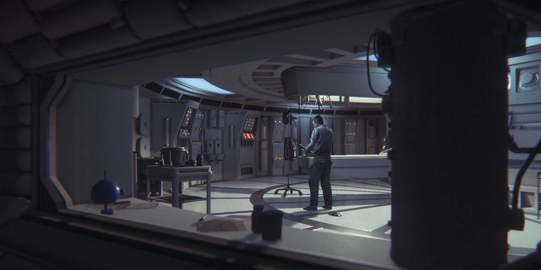 A man standing in the middle of a room in a space ship