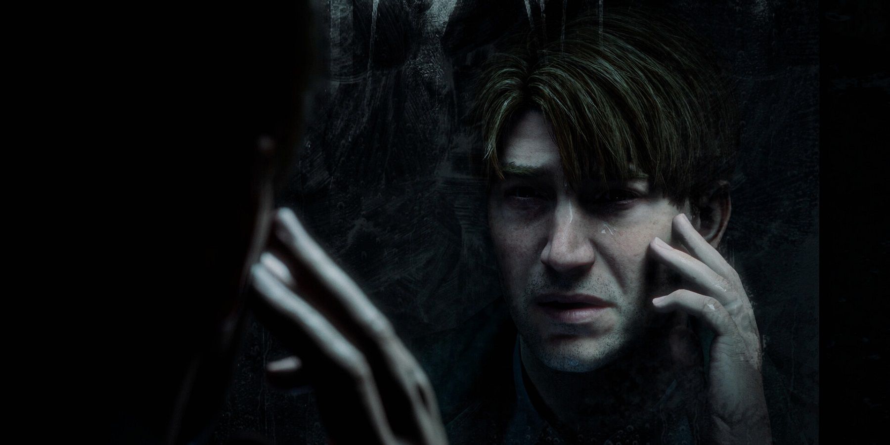 James Ferguson on a call while looking into the mirror