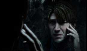 James Ferguson on a call while looking into the mirror