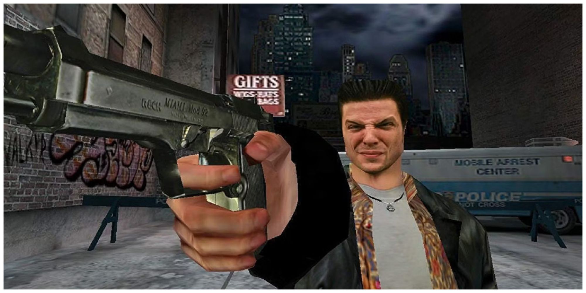 Screenshot from Max Payne video game of Max Payne pointing a pistol with police car behind him