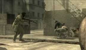 Sceenshot from Metal Gear Solid 4: Guns of the Patriots video game of two armed soldiers with one squatting