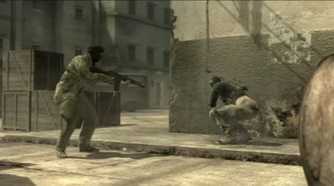 Sceenshot from Metal Gear Solid 4: Guns of the Patriots video game of two armed soldiers with one squatting