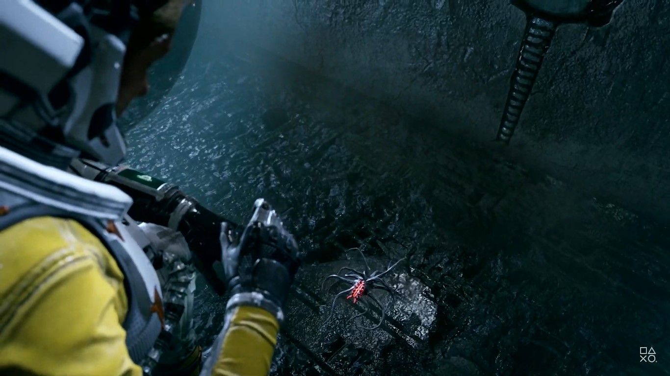 Screenshot from video game Returnal of Selene in space suit bending down to look at a parasite.