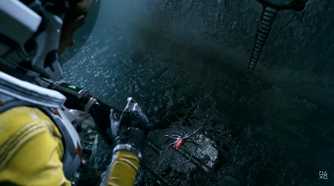 Screenshot from video game Returnal of Selene in space suit bending down to look at a parasite.