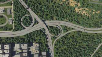 A large highway going through a forest