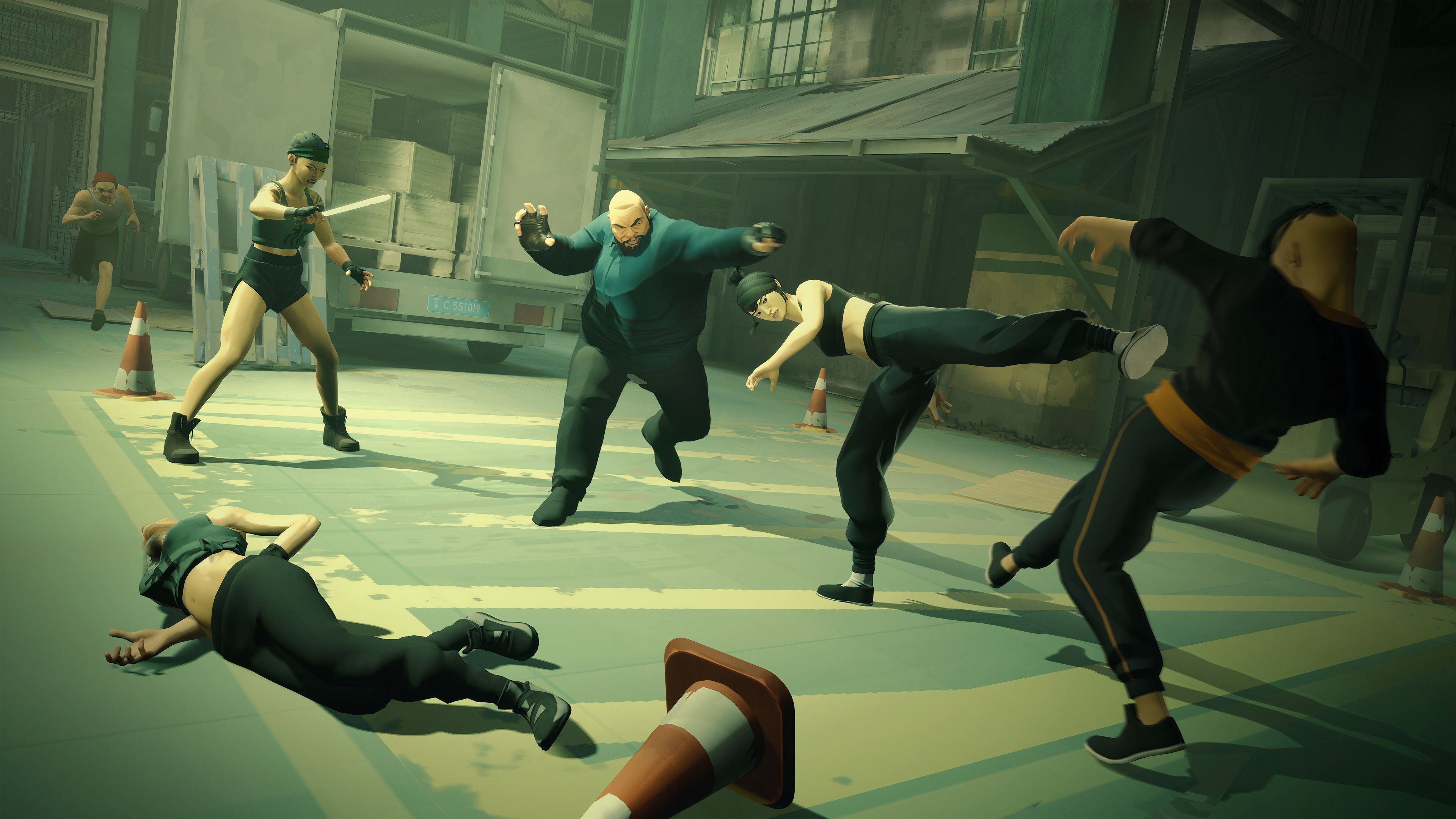 fist-fighting multiple people, one of whom is armed with a knife.