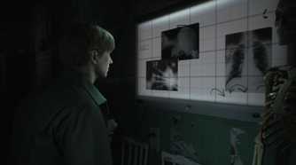 James looking at an x-ray in a hospital room