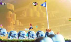 Mario riding a stampede through a goal flag in Super Mario Bros. Wonder