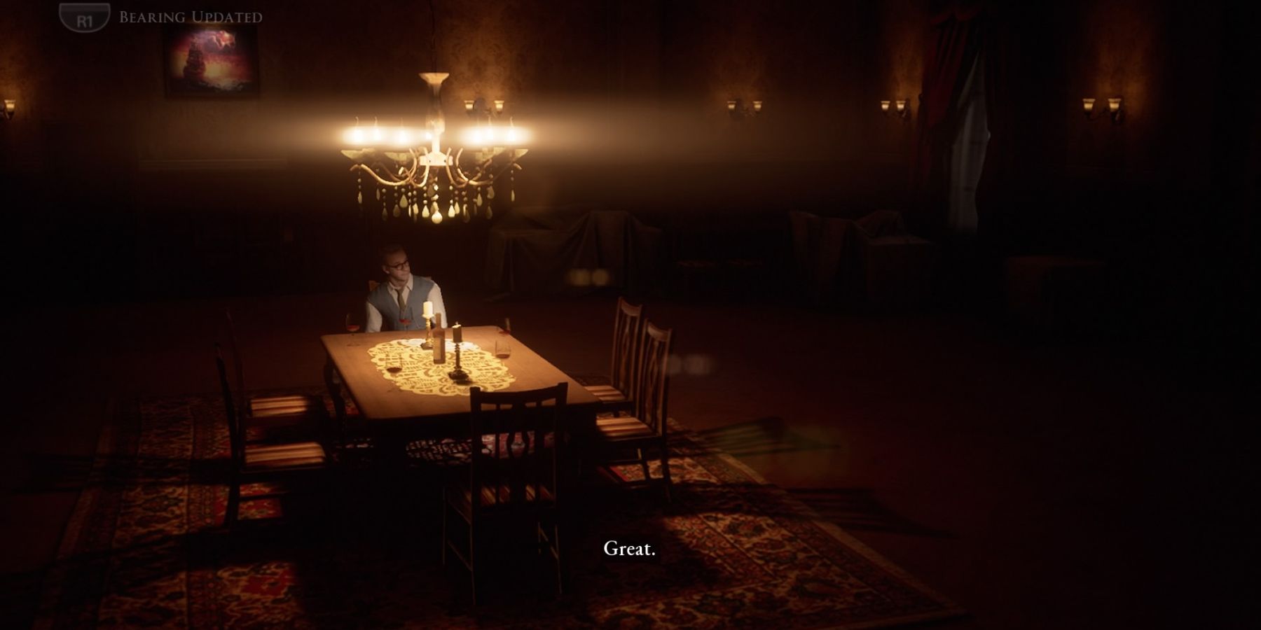 A man sitting alone at a dinner table with a lit chandelier above him