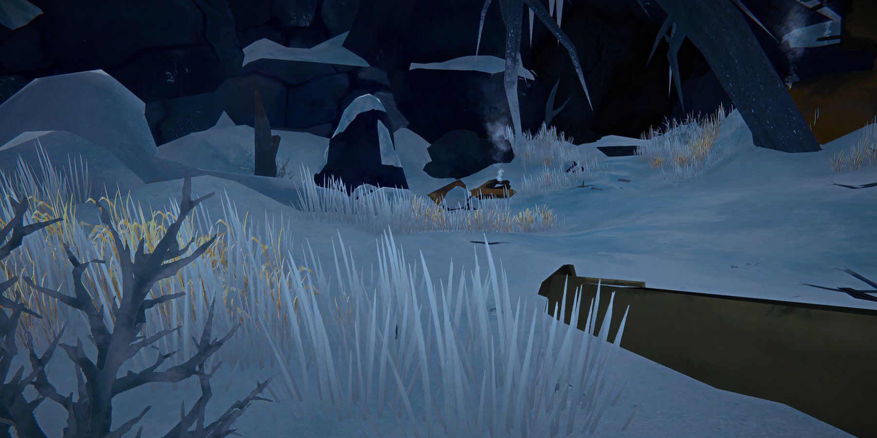 Screenshot from The Long Dark video game where player character is hunting a rabbit in a snowy wilderness.