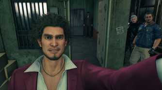 Yakuza: Like A Dragon Ichiban taking a selfie with Adachi