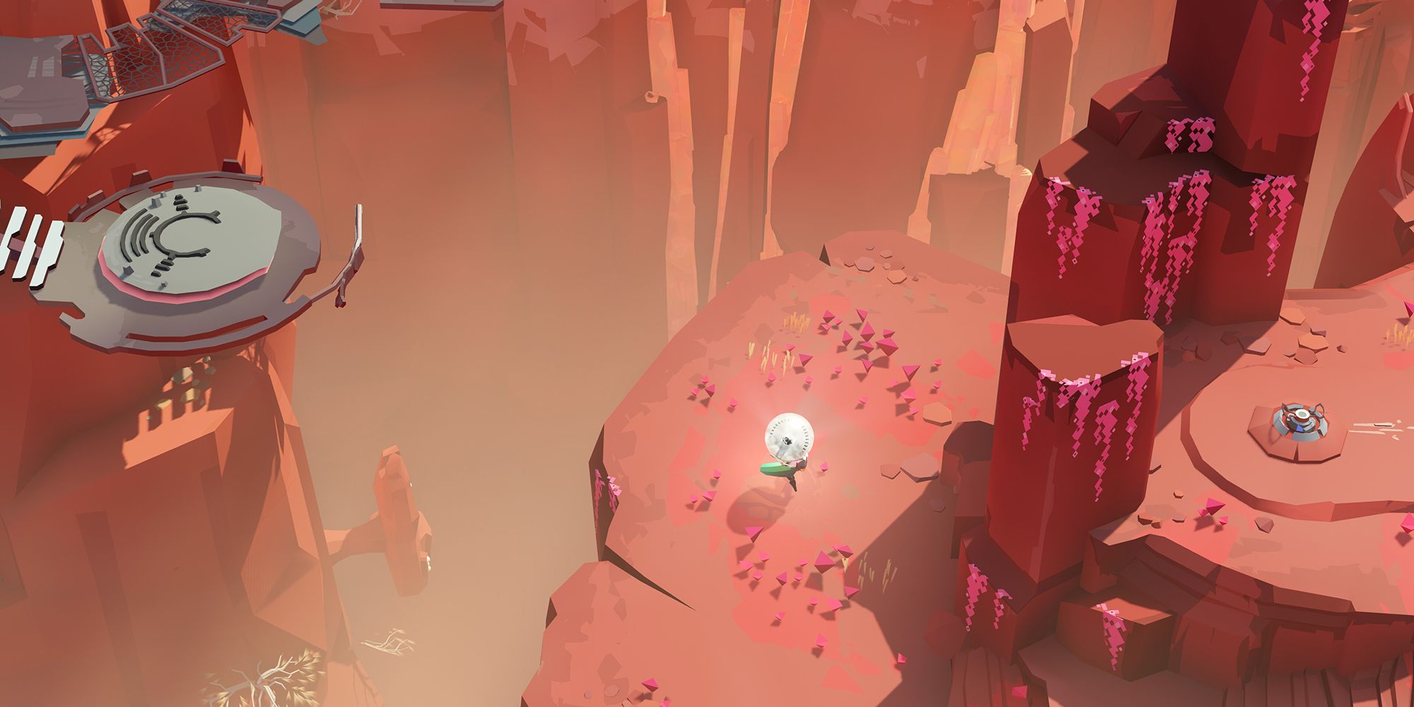 Screenshot from Cocoon video game of bug character carrying bright orb in a desert mountain setting.