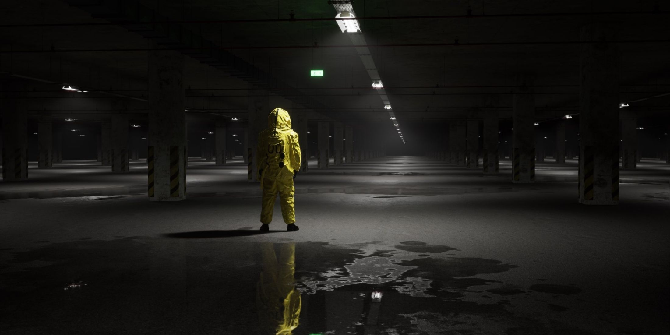 A man in a hazmat suit in a dark underground parking lot
