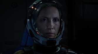 Screenshot from Returnal video game of main character Selene in space suit.