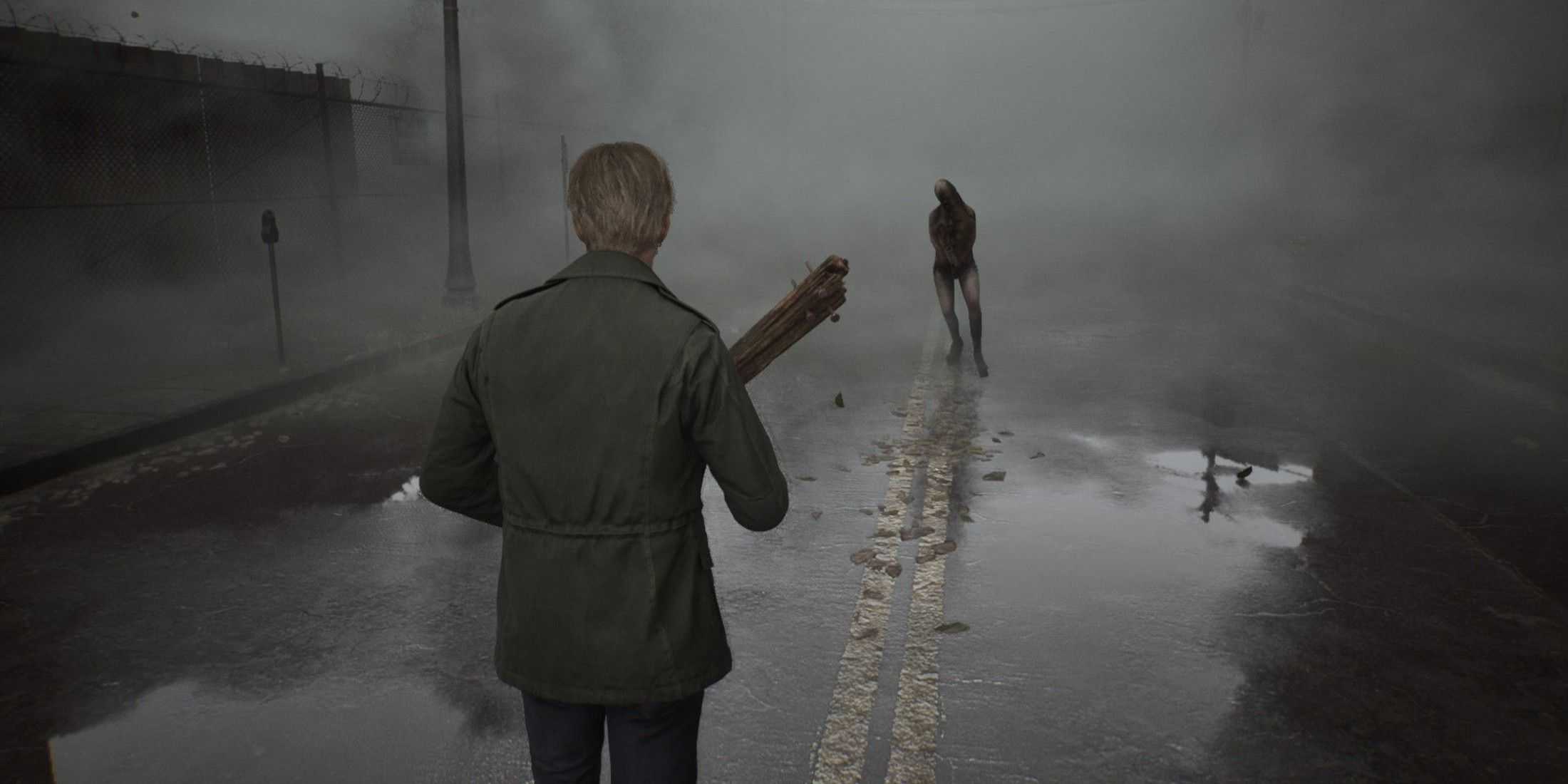James fighting a monster on a foggy street