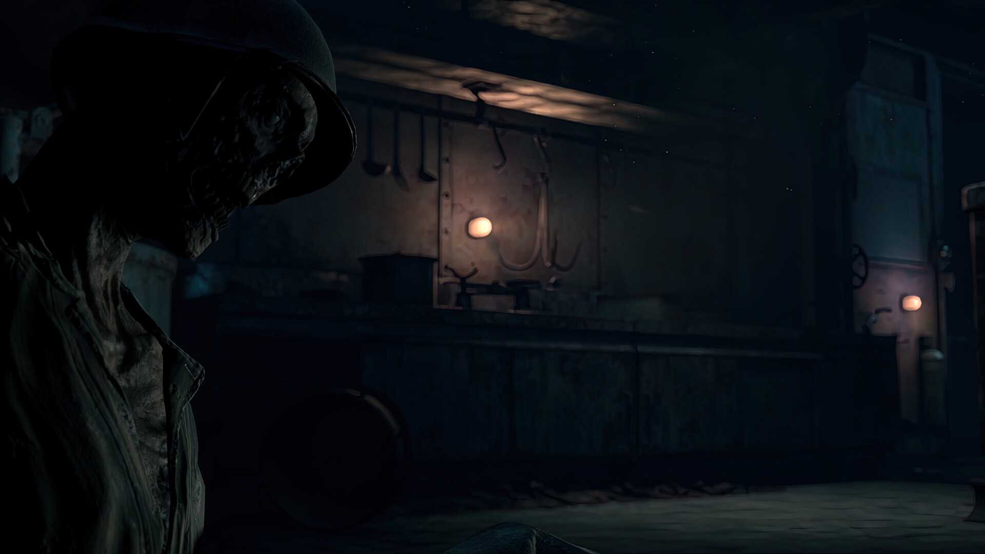 A dark room with an upright corpse on the left side