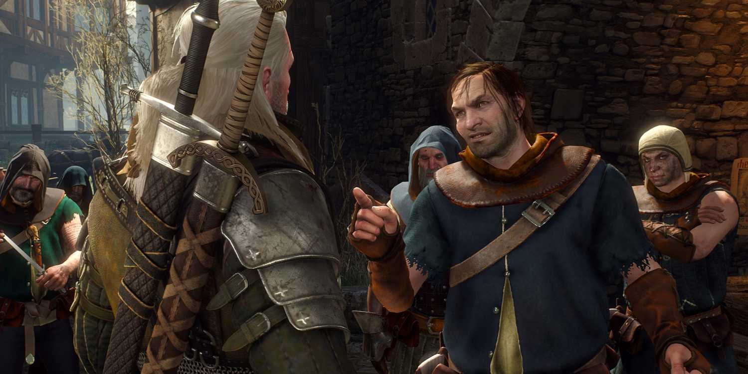 Geralt facing an angry mob of villagers