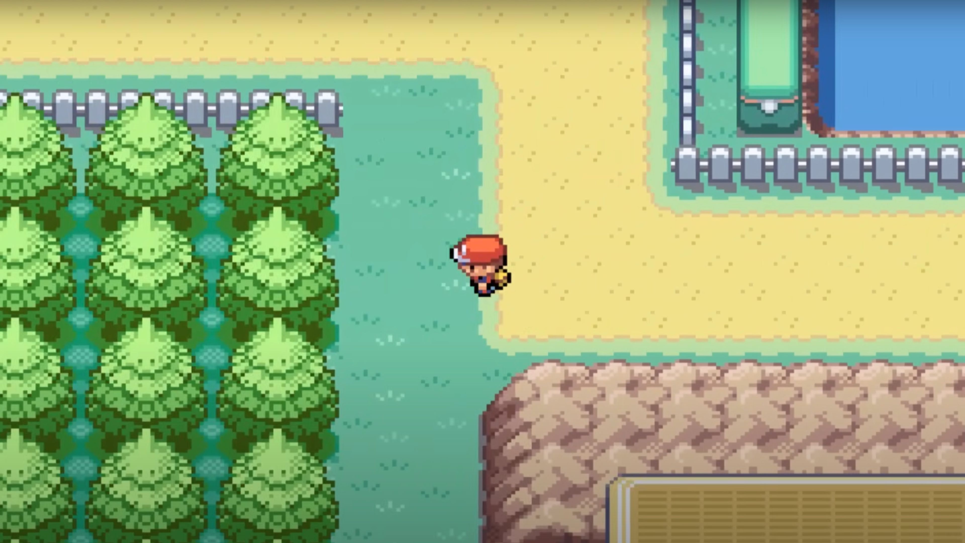 pokemon fire red showing Red standing on a route near a lake