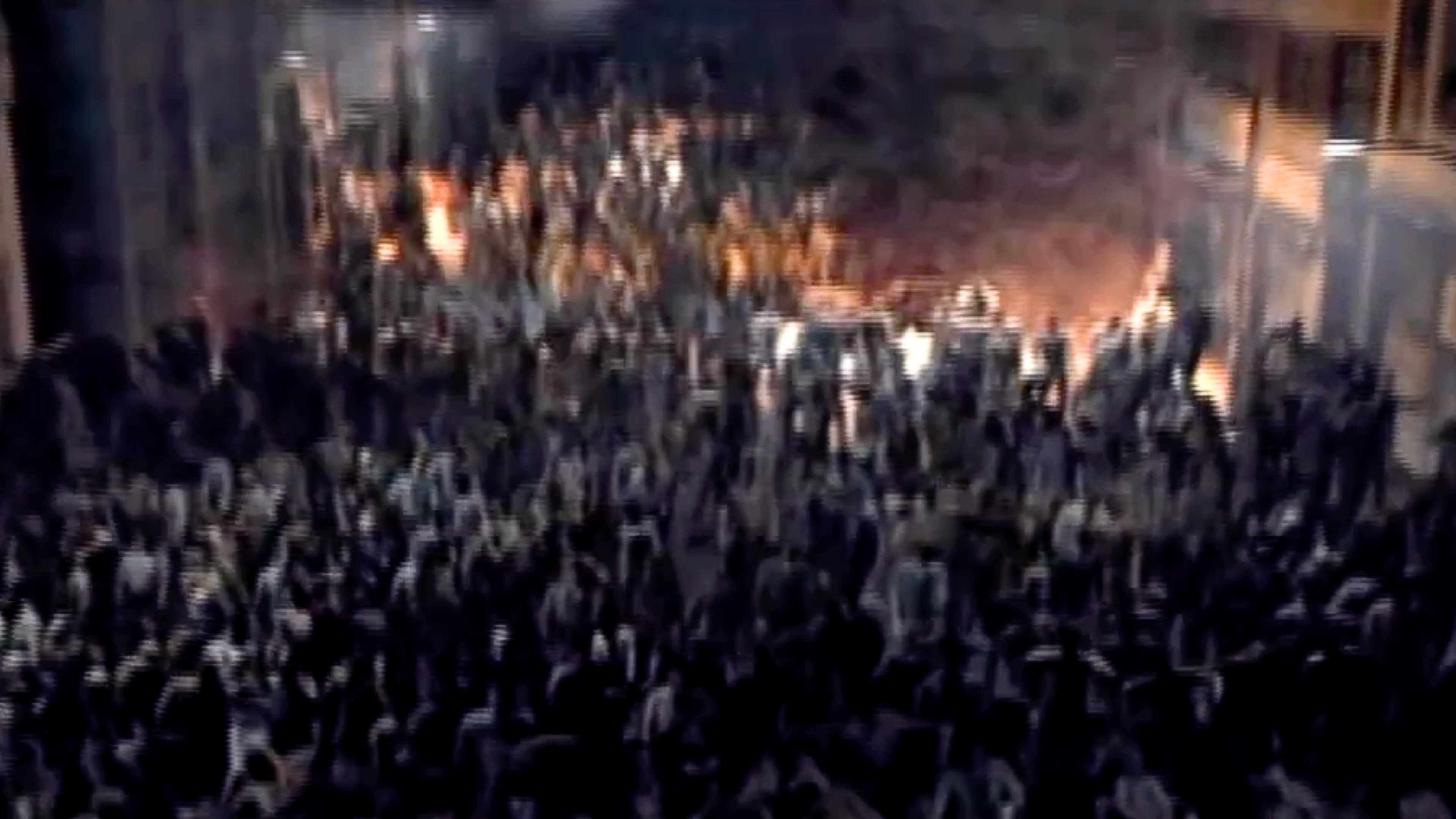 A screenshot a group of zombies in Resident Evil Outbreak