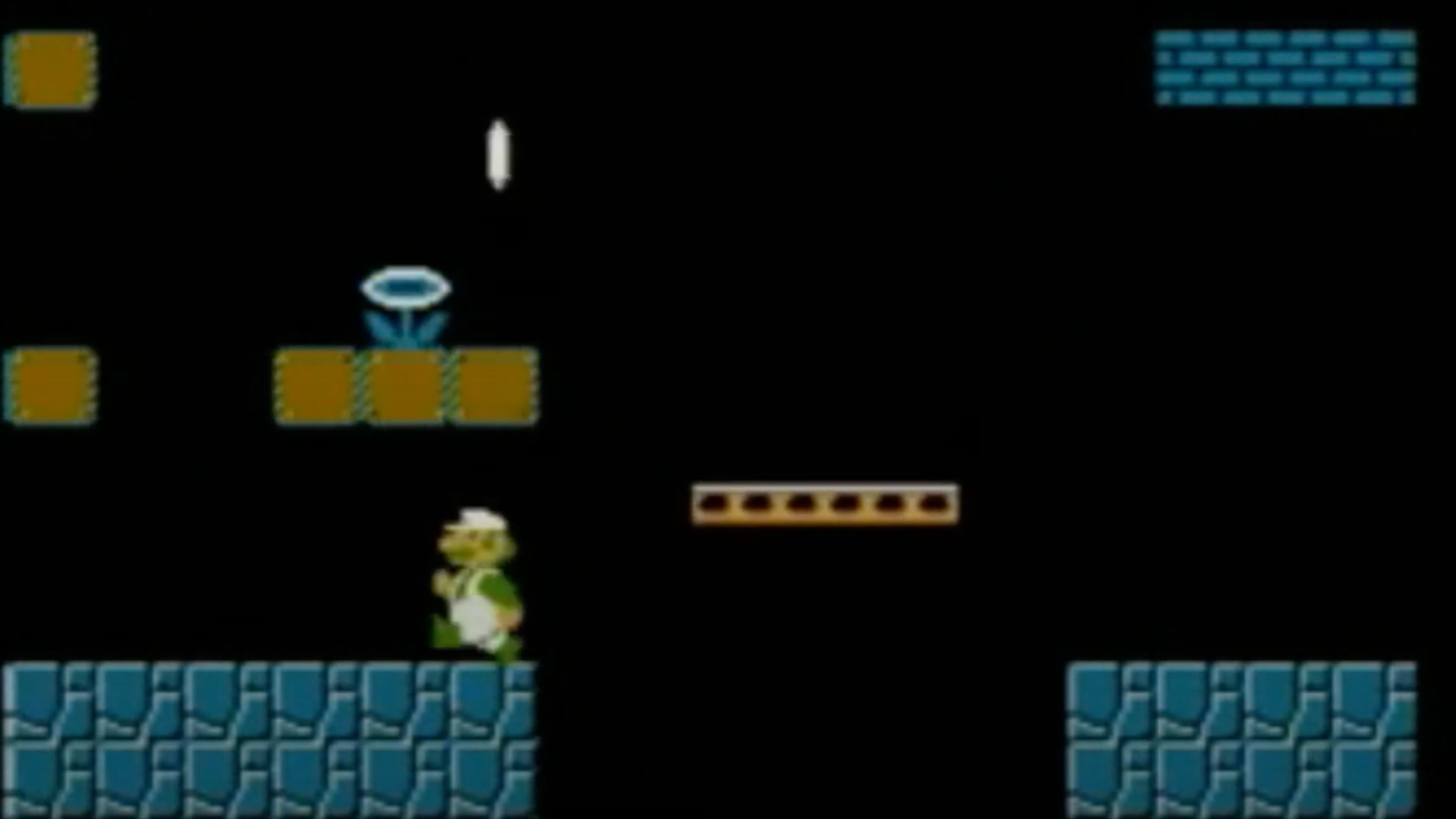 A screenshot of gameplay with Luigi in Super Mario Bros.