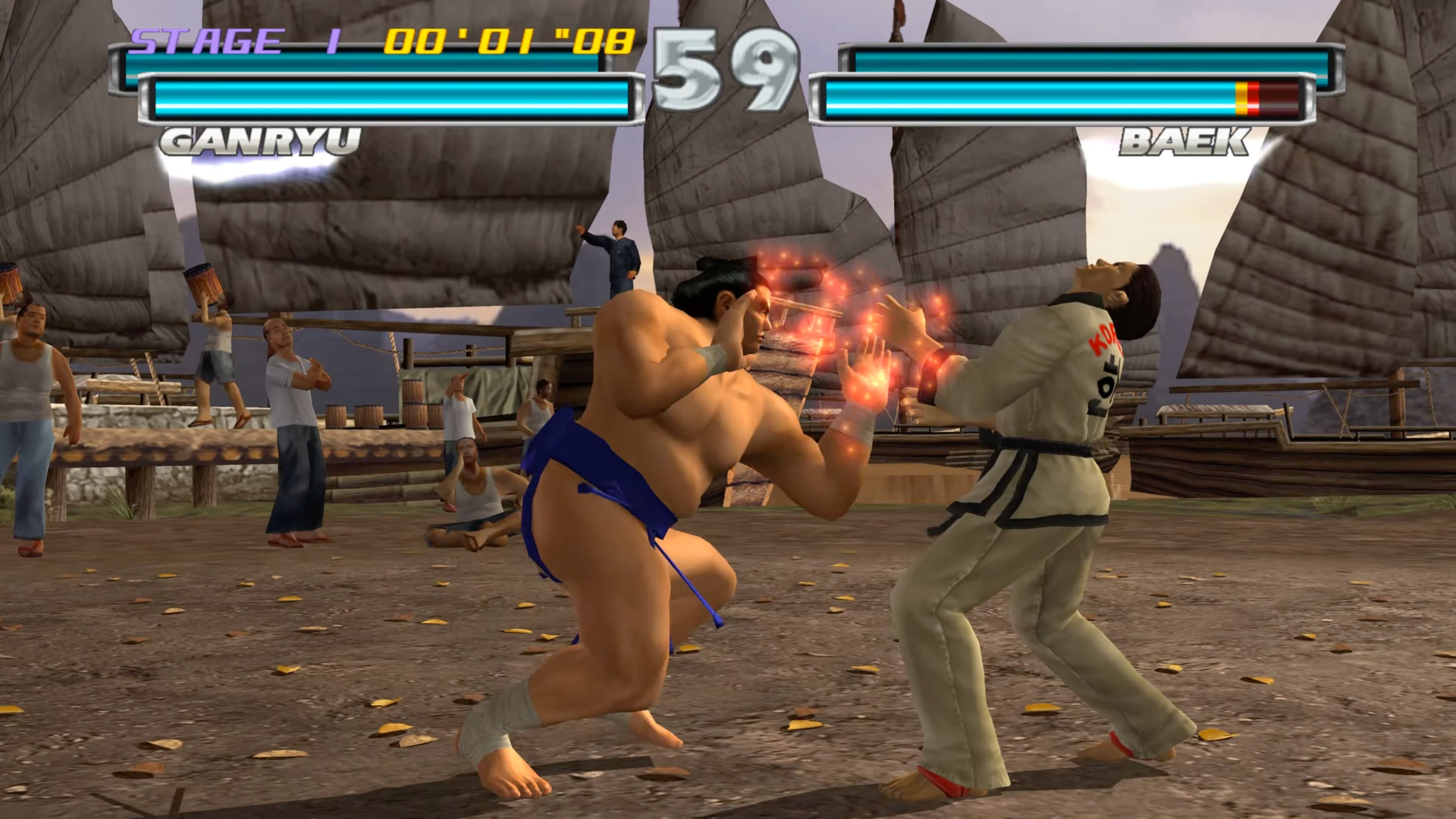A screenshot of Ganryu and Baek in a match in Tekken Tag Tournament