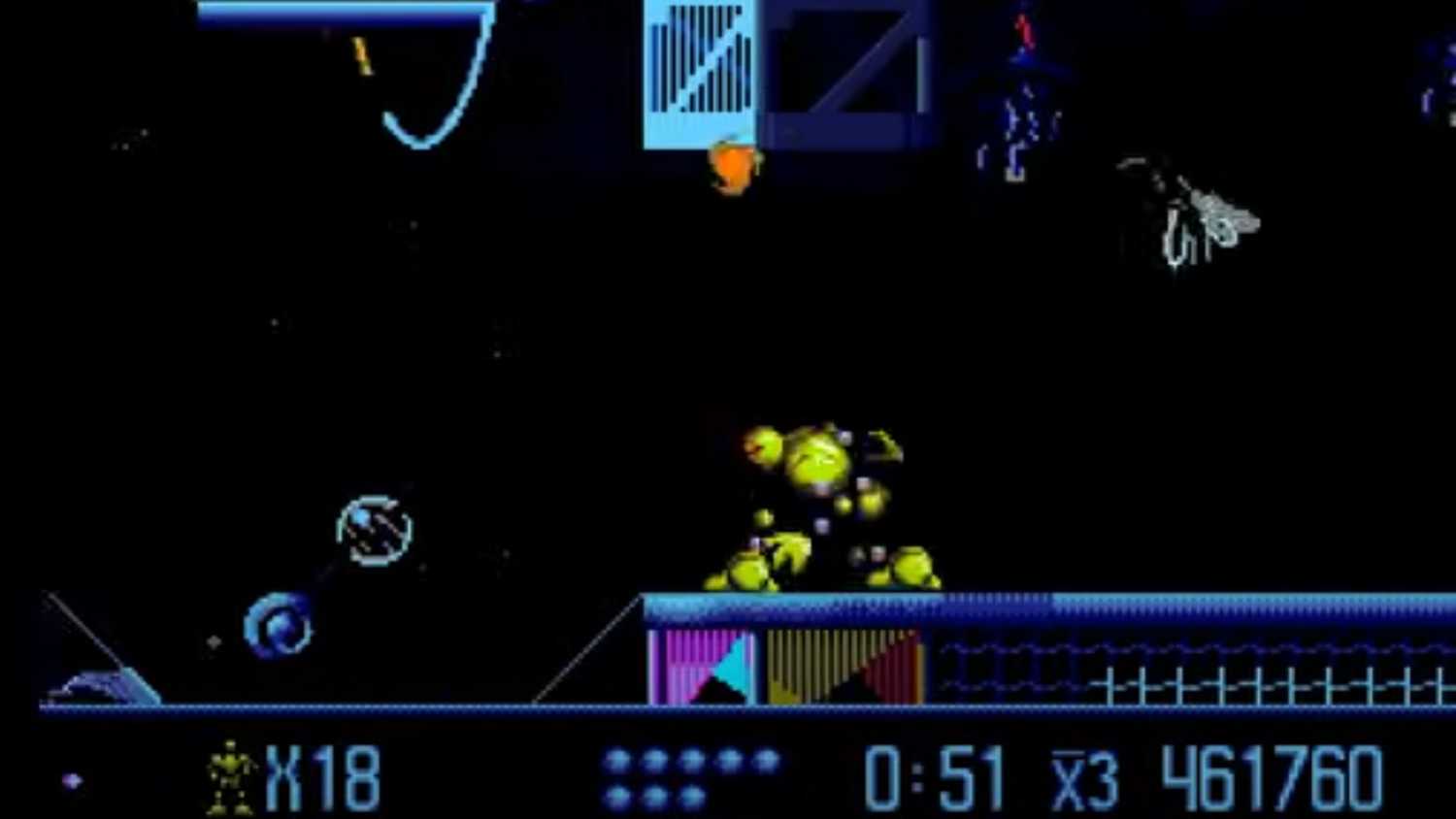 A screenshot of Vectorman ducking against an enemy from Vectorman