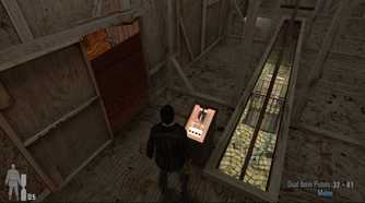Screenshot from Max Payne 2: The Fall of Max Payne video game of Max Payne standing in unfinished building