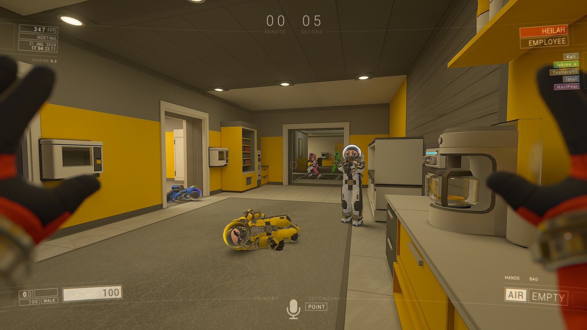 A player pointing a gun at another player with his hands up