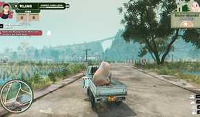 promise mascot agency pinky riding in the back of the truck