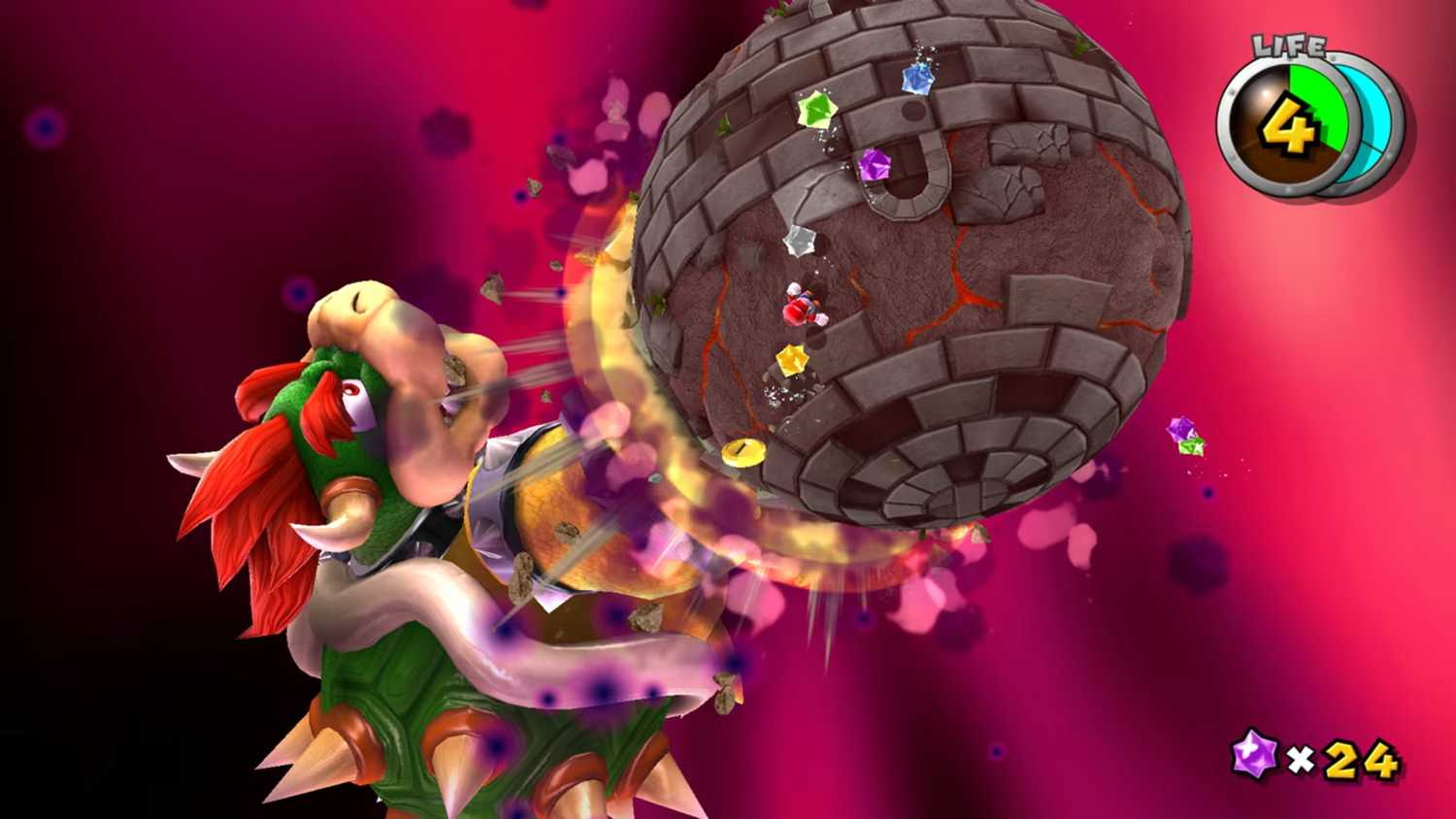 A screenshot of Mario battling a giant Bowser in Super Mario Galaxy + Super Mario Galaxy 2