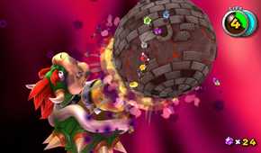 A screenshot of Mario battling a giant Bowser in Super Mario Galaxy + Super Mario Galaxy 2