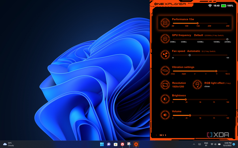 A screenshot of a Windows 11 desktop with the One Xplayer overlay open over it. The overlay shows controls for CPU and GPU performance, fan speeds, vibration intensity, screen resolution, RGB lighting, brightness, and volume.
