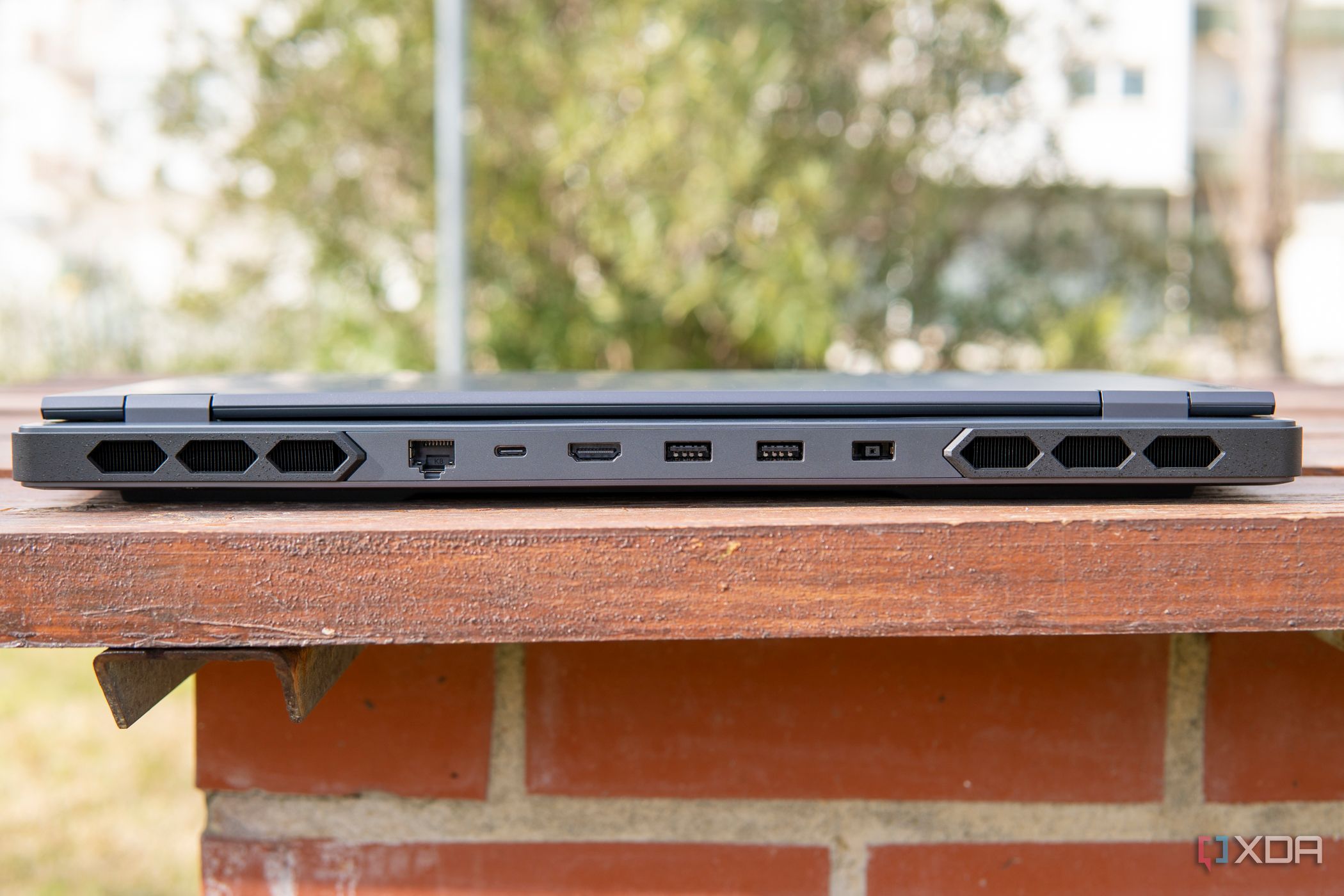 Rear view of the Lenovo Legion Pro 7i Gen 8 with the lid closed showing the ports on the back