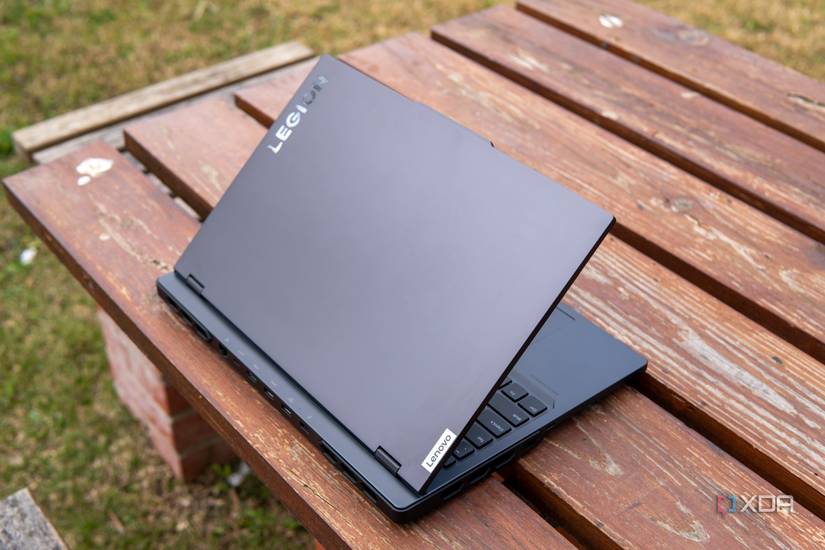 Angled rear view of the Lenovo Legion Pro 7i Gen 8 on a wooden table