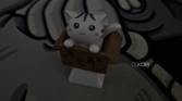 An image showing an artisan keycap of a cat in a box in dark.