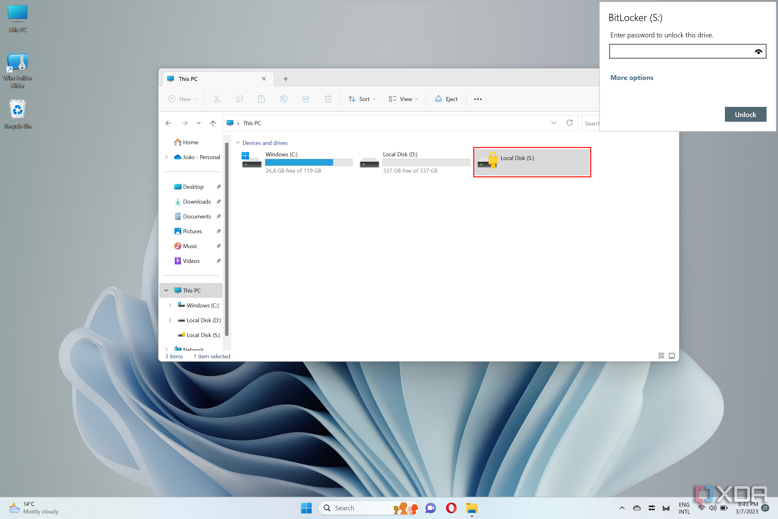 Screenshot of Windows 11 File Explorer and BitLocker asking the user for a password to access a drive