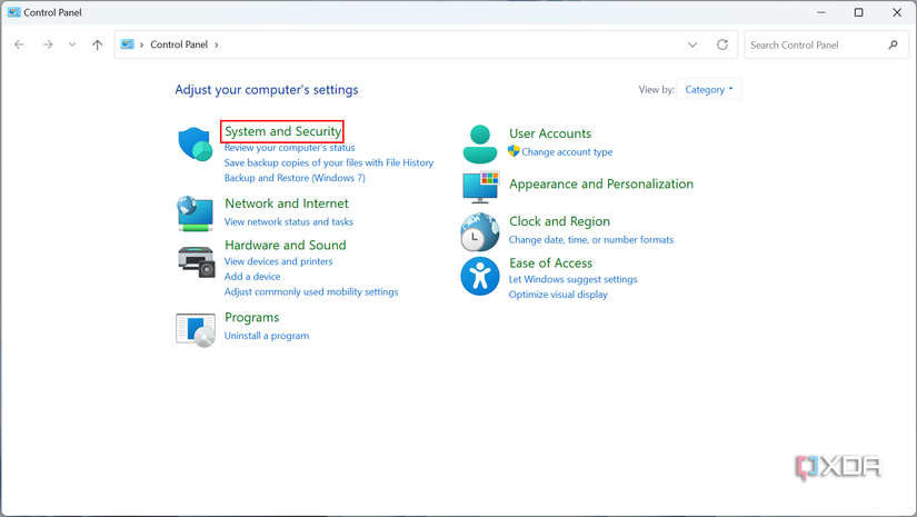 Screenshot of Windows 11 Control Panel with System and Security section highlighted