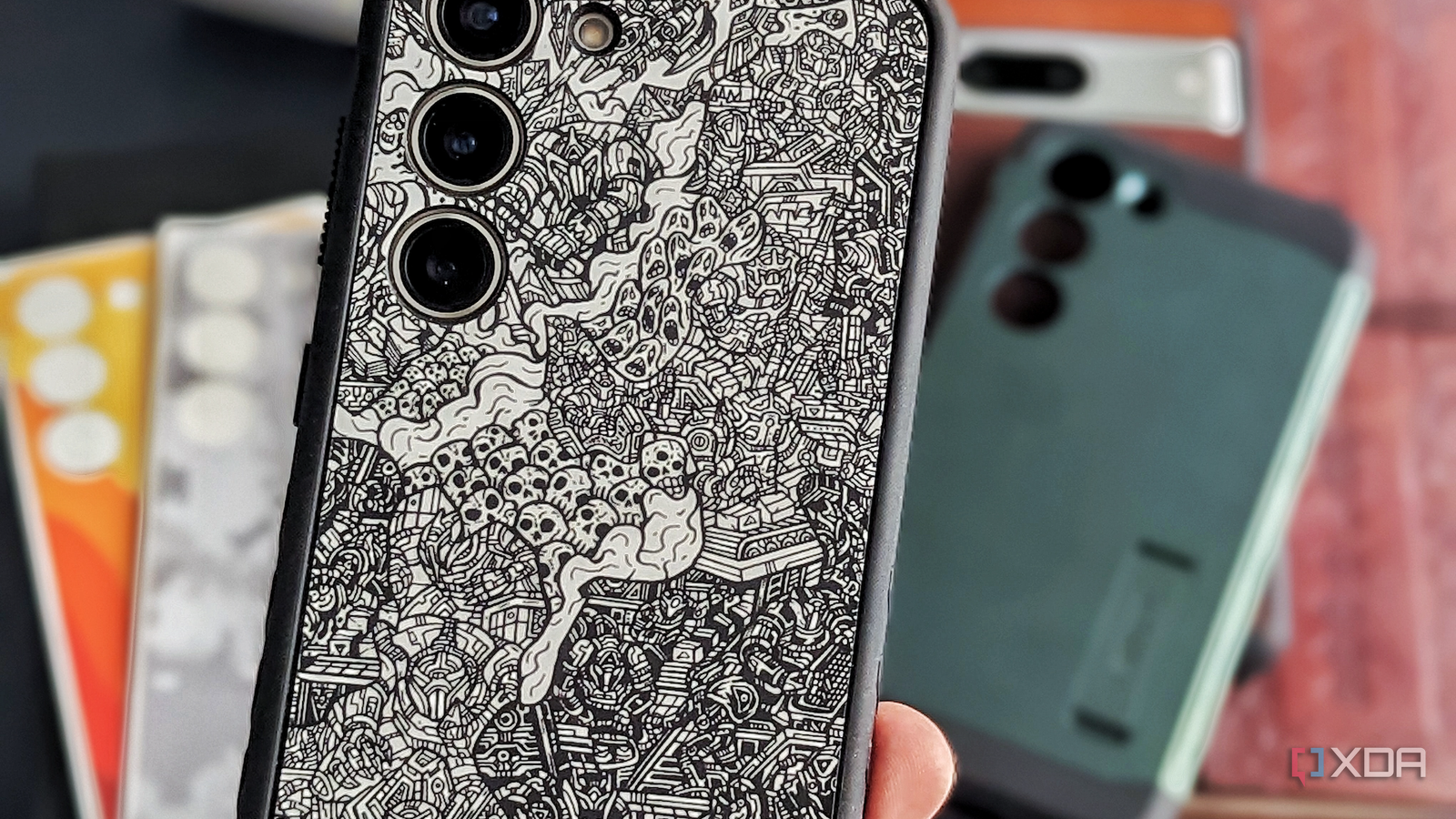 An image of the dbrand grip case with a robot skin installed on a Galaxy S23.
