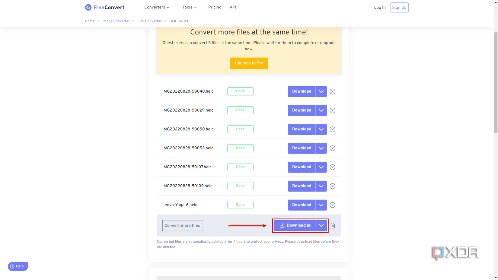 Screenshot of FreeConvert.com with a Download all button highlighted