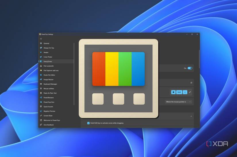 Screenshot of the PowerTOys settings window over the Windows 11 desktop background, with a PowerToys logo laid over it