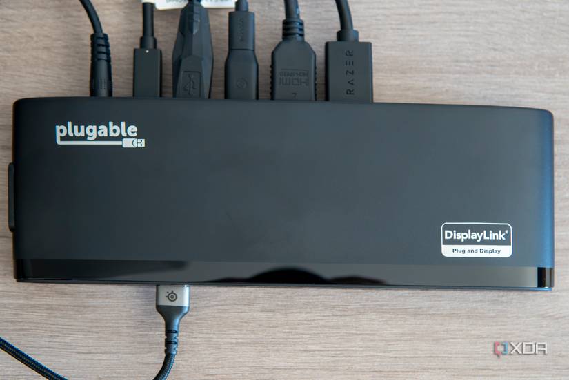 Top-down view of the Plugable UD-3900PDH Docking station with multiple peripherals connected
