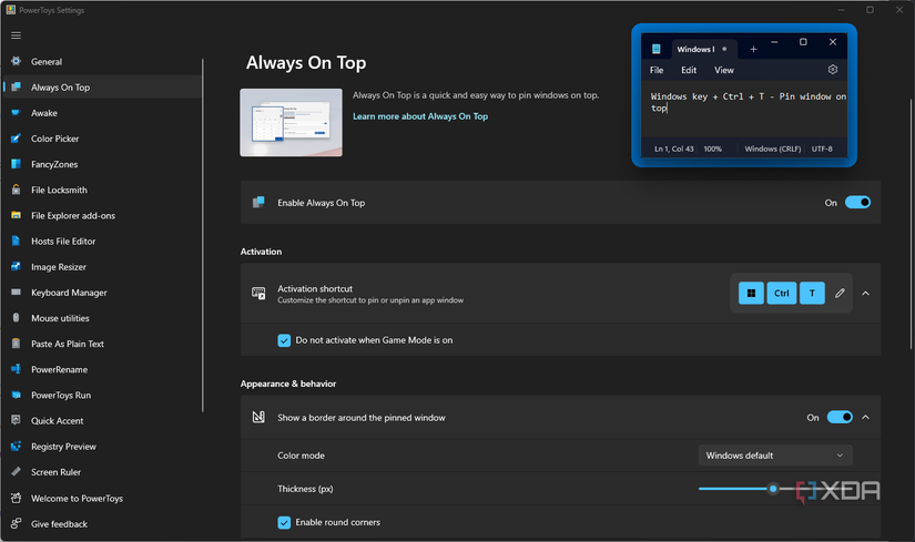 Screenshot of the PowerToys settings window with a Notepad window pinned on top