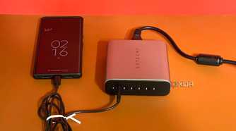 Satechi GaN 200W USB C Charger with a phone