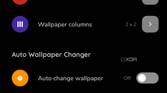 A screenshot showing STOKiE wallpaper app settings over a black-colored background.