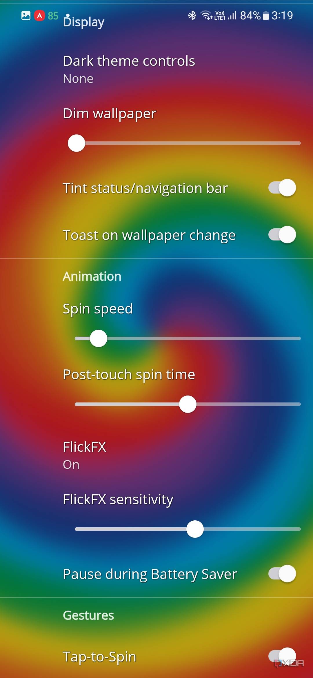 A screenshot showing a bunch of wallpaper customization options over a colorful spiral background.
