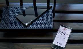 TP-Link Archer AXE75 router with speed test from an Archer AXE300