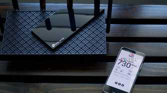 TP-Link Archer AXE75 router with speed test from an Archer AXE300