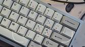 A screenshot showing the Google Lens viewfinder with a keyboard on a deskmat in frame.