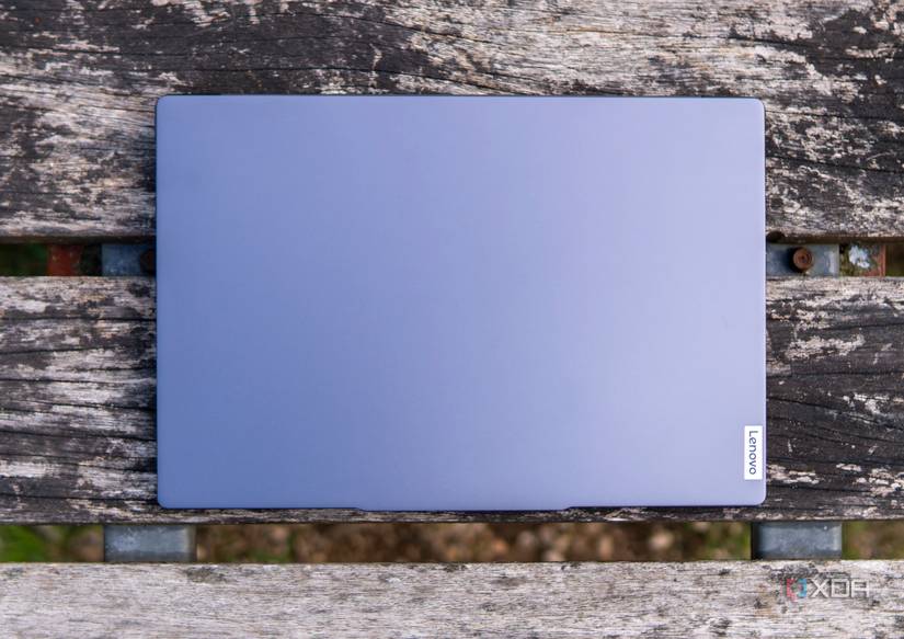 Overhead view of the Lenovo Slim Pro 7 with the lid closed on a wooden table